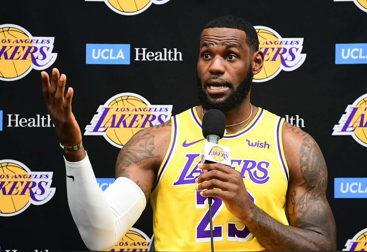 (FILES) In this file photo taken on September 27, 2019 Laker forward LeBron James speaks during the Los Angeles Lakers media day in El Segundo, California. - Basketball superstar LeBron James on October 14, 2019, has sharply criticised a Houston Rockets executive for angering China with a tweet supporting protesters in Hong Kong, saying the executive was "misinformed" and should have kept his mouth shut. (Photo by FREDERIC J. BROWN / AFP) (Photo by FREDERIC J. BROWN/AFP via Getty Images)