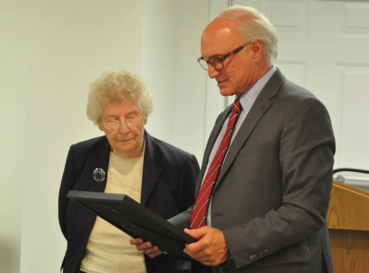 Christine Robertson was honored by First Selectman Rudy Marconi for her service to the town through years of work on the Commission on Aging. Fellow commission members Kathleen Brennan and Mary Ann O'Grady were also recognized..