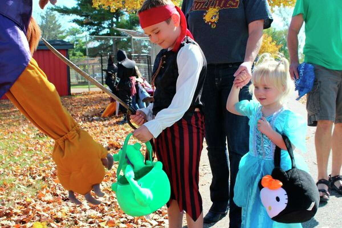 Children participate in a previous Halloween in the Park. This year, it will take place on Saturday, Oct. 26. (Herald Review file photo)