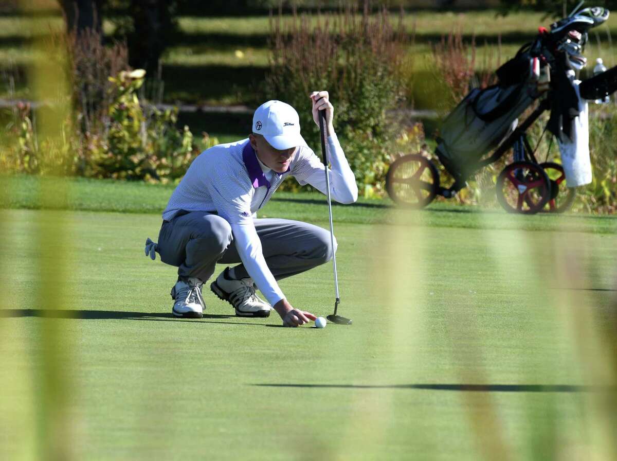 Paul Goetz of Shenendehowa lines up his shot on the 18th hole during Section II golf championship play on Tuesday, Oct. 15, 2019, at Orchard Creek in Guilderland, N.Y. (Will Waldron/Times Union)