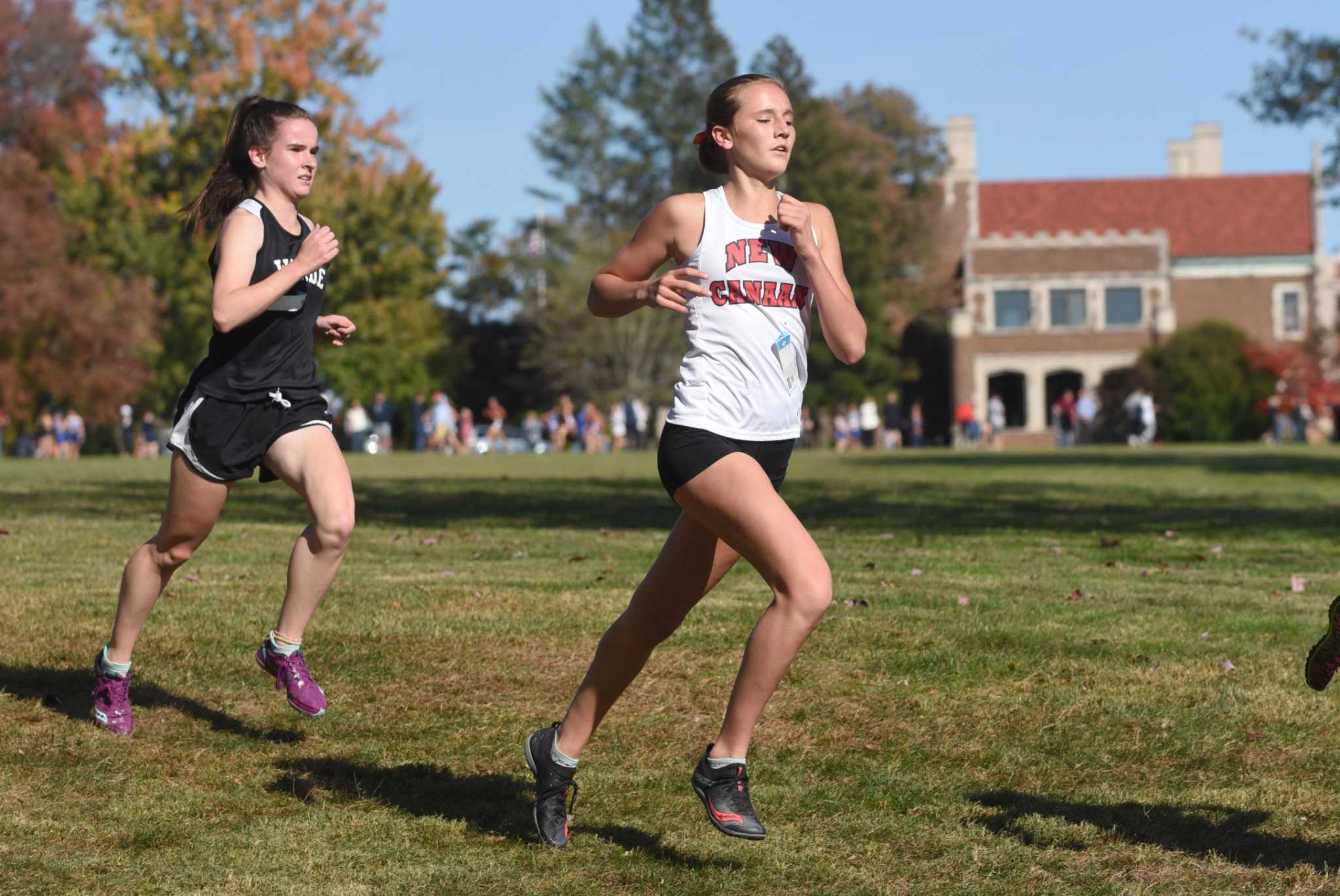 New Canaan girls cross country runs third at FCIAC championship
