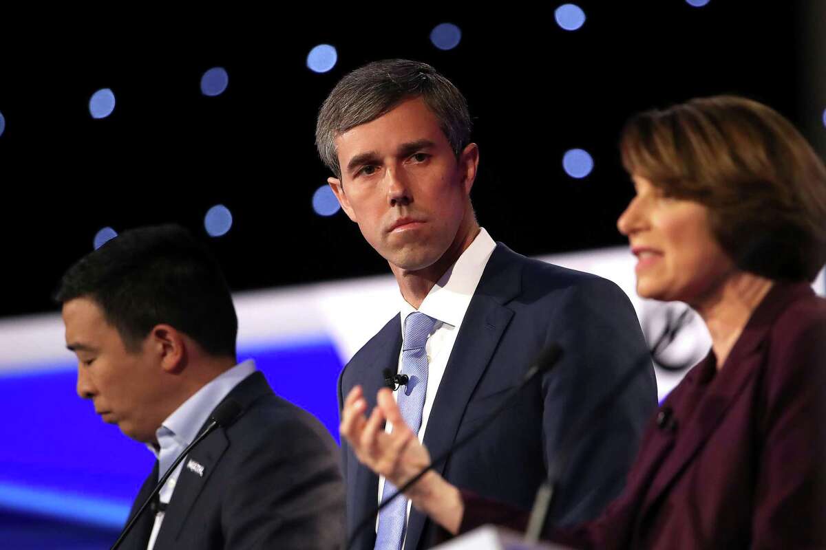 WESTERVILLE, OHIO - OCTOBER 15: Former Texas congressman Beto O'Rourke and former tech executive Andrew Yang look on as Sen. Amy Klobuchar (D-MN) speaks during the Democratic Presidential Debate at Otterbein University on October 15, 2019 in Westerville, Ohio. A record 12 presidential hopefuls are participating in the debate hosted by CNN and The New York Times. (Photo by Win McNamee/Getty Images)