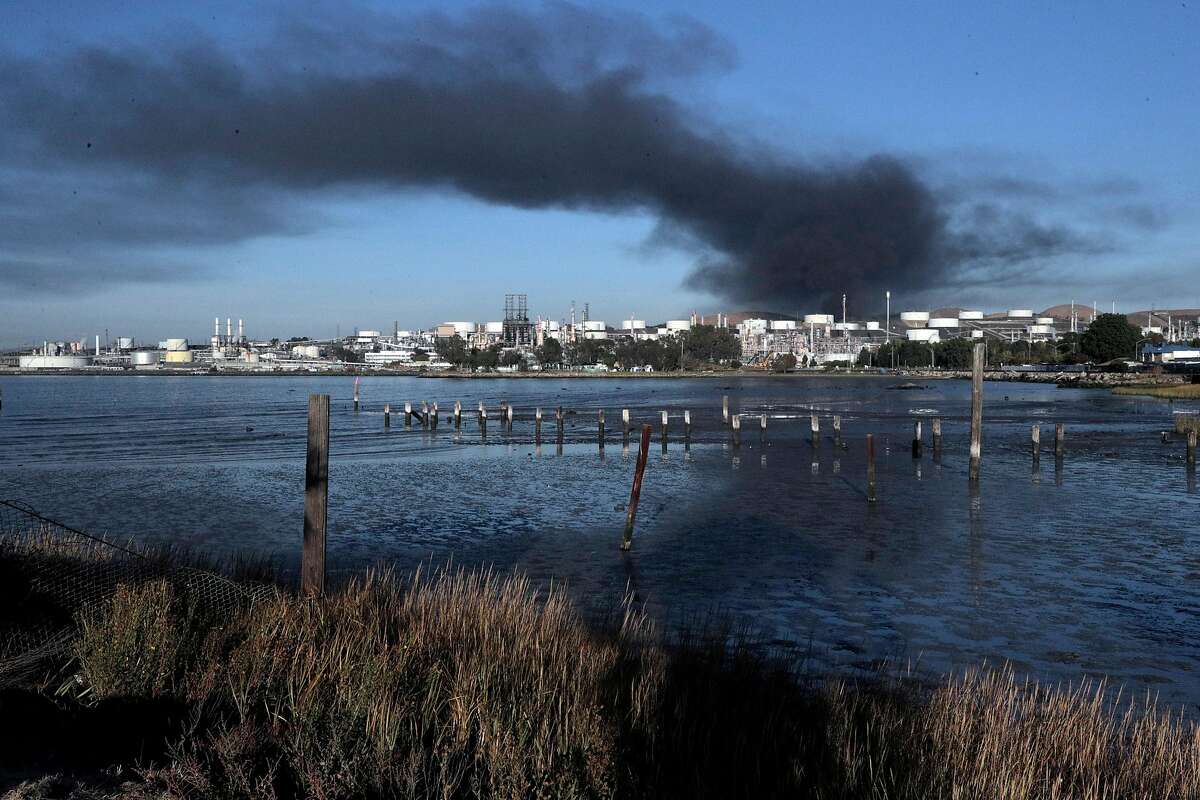 Thick black smoke rises into the air as seen from D & R Marine in Rodeo after an explosion and fire at the NuStar Energy facility in Crockett, Calif., on Tuesday, October 15, 2019. Interstate 80 in the vicinity was shut down for hours causing gridlock on surrounding nearby streets and nearby residents were asked to shelter in place as thick black smoke possibly containing hazardous compounds filled the air in the area.