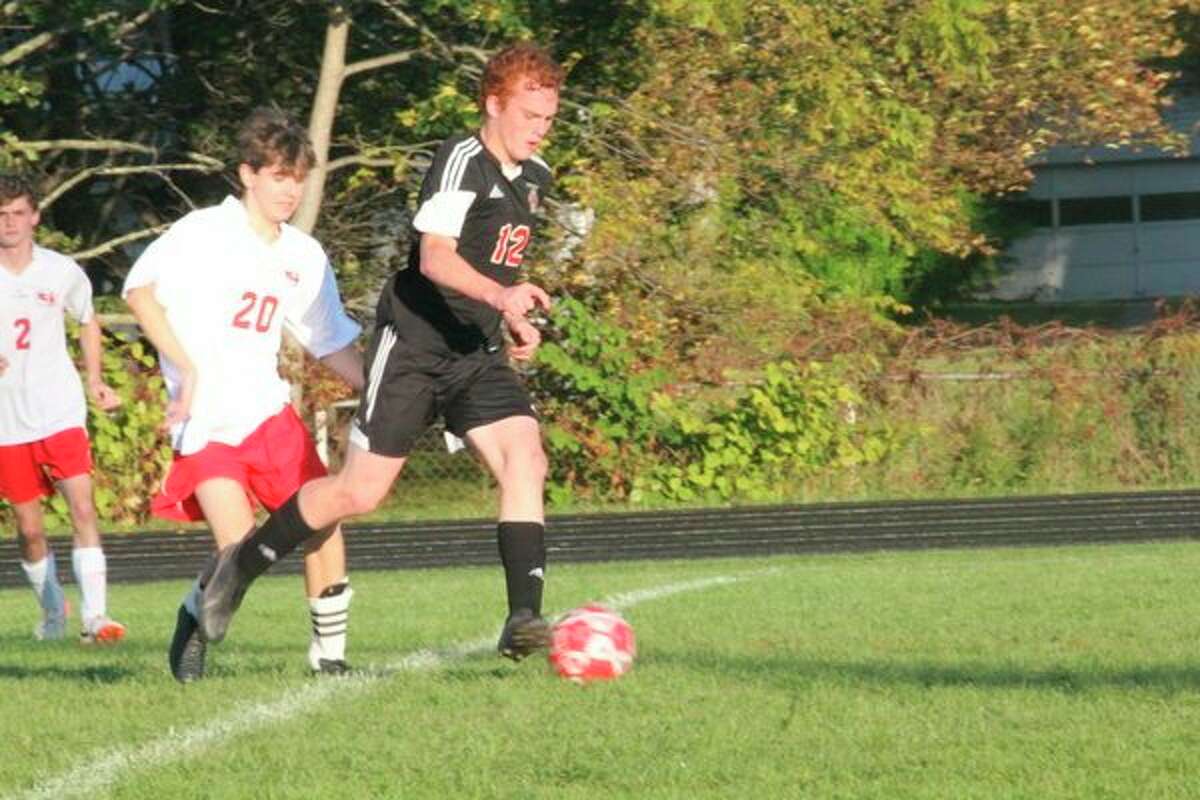 Reed City's Ethan Maddox surges down the field against Kent City. (Herald Review photo/John Raffel)