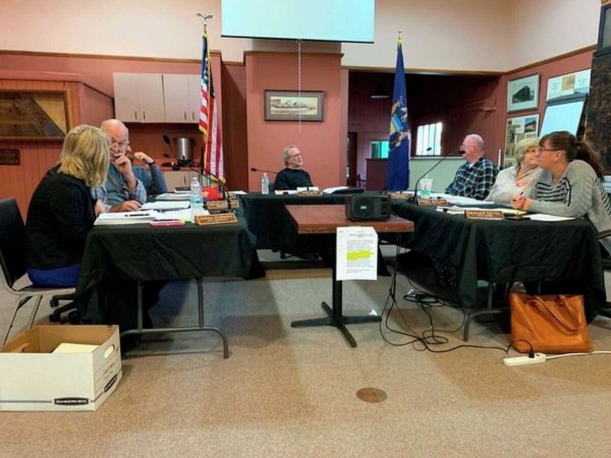 Evart city council members expressed their opposition to a proposal that the city vacate sections of First Street and Washington Street to the Evart Housing Commission at their meeting on Monday, Oct. 7. Council decided to further research the issue and take it up again at a later meeting. (Herald Review photo/Cathie Crew)