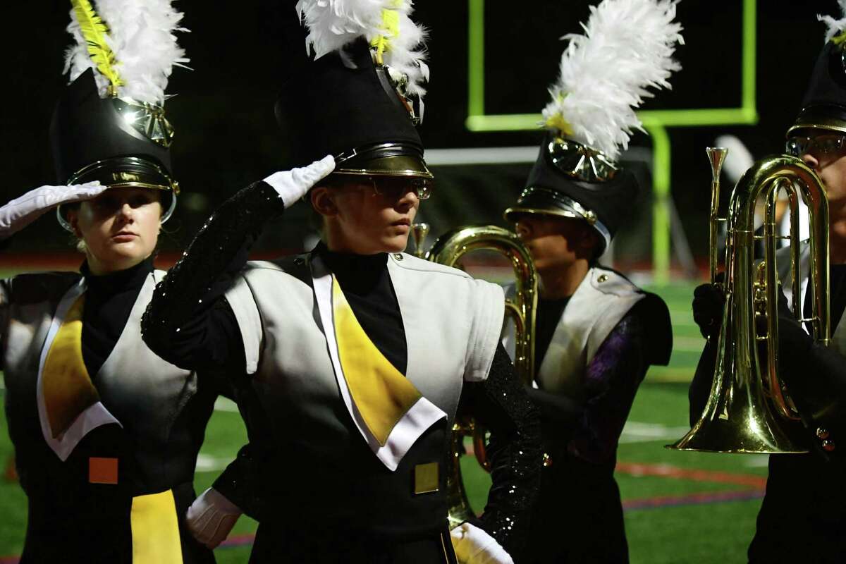 Trumbull High School Marching Bands perform their halftime field show as Norwalk High School hosts The Cavalcade of Bands Saturday, October 12, at the school in Norwalk.