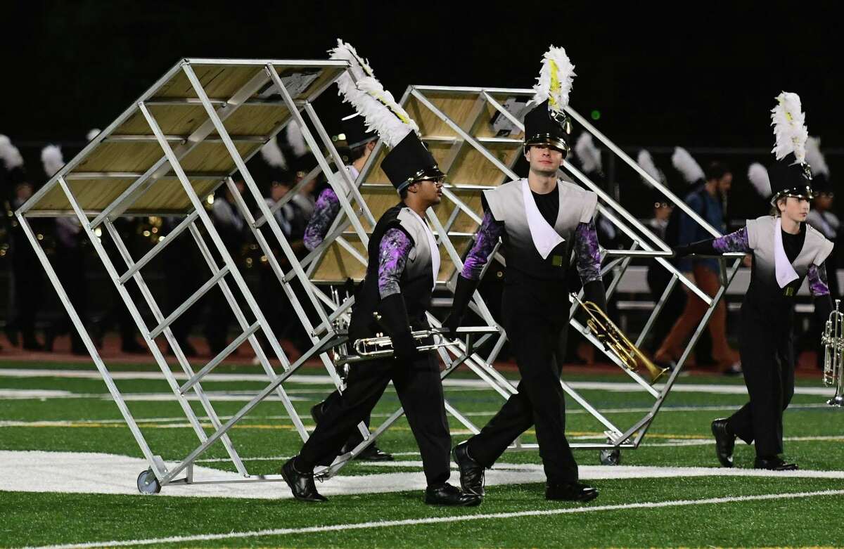 Trumbull High School Marching Bands perform their halftime field show as Norwalk High School hosts The Cavalcade of Bands Saturday, October 12, 2019, at the school in Norwalk, Conn.