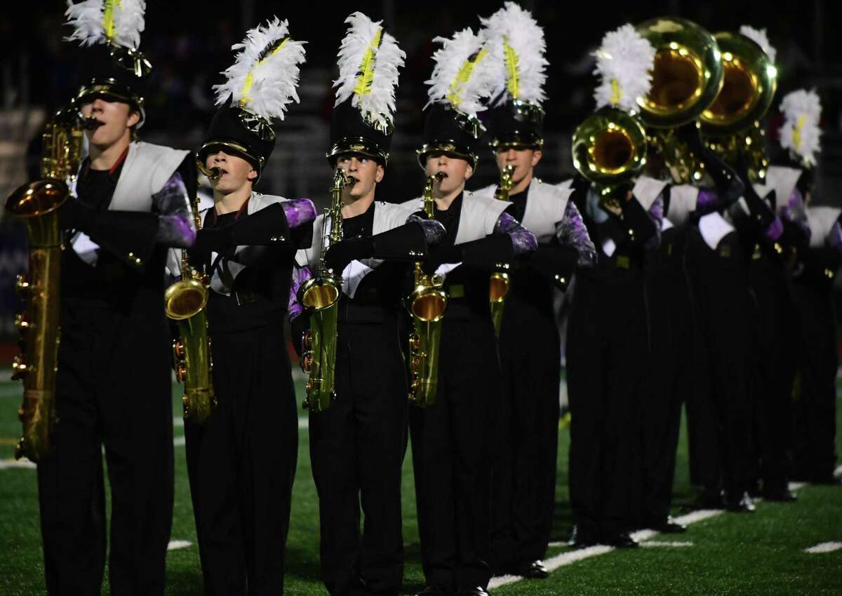 Trumbull High School Marching Bands perform their halftime field show as Norwalk High School hosts The Cavalcade of Bands Saturday, October 12, 2019, at the school in Norwalk, Conn.