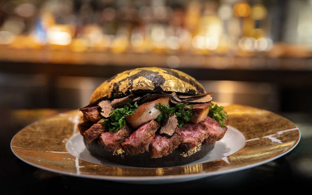The Post Oak Hotel in Uptown has created a burger called The Black Gold, priced at $1,600. The wagyu burger, topped with foie gras and black truffles comes on a 24-karat gold flecked bun that is infused with caviar; burger is served with a bottle of 2006 Dom Perignon champagne.