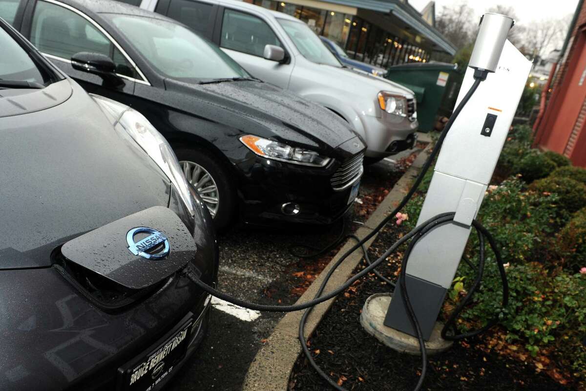 A couple of cars plugged into the EV Charging Station behind Ridgefield Town Hall, in Ridgefield.