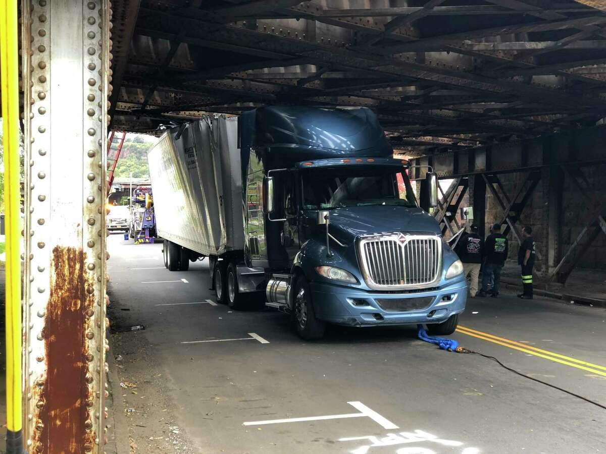 A truck became stuck under a bridge at 470 James St. in New Haven Wednesday morning.