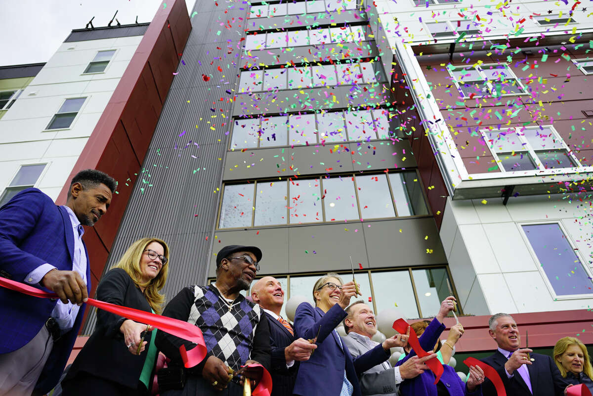 Elected officials and community leaders celebrate at a ribbon cutting event for affordable housing at 280 North on Wednesday, Oct. 16, 2019, in Albany, N.Y. 280 North is the second phase of the redevelopment of the site where Ida Yarbrough Homes once stood. (Paul Buckowski/Times Union)