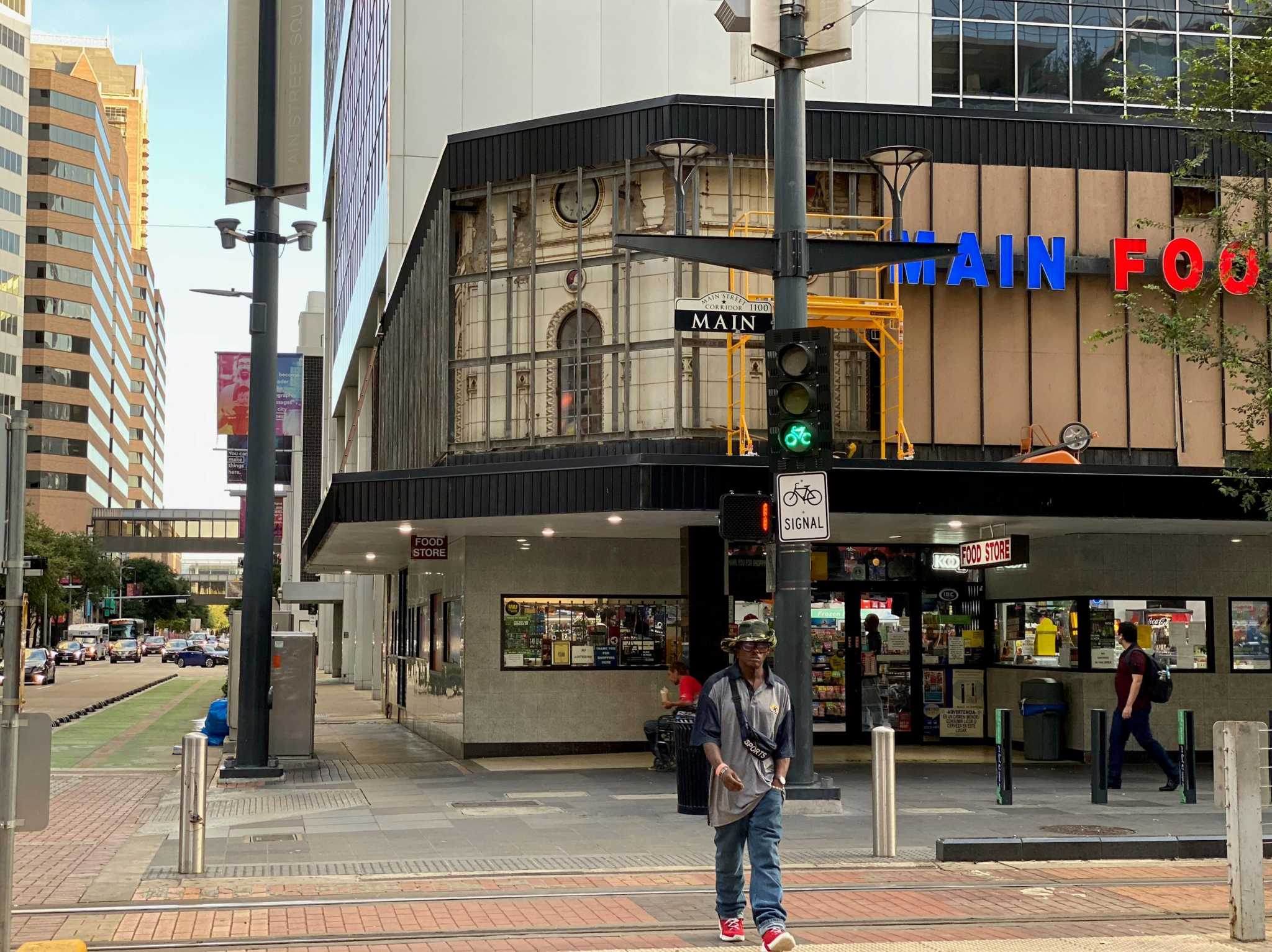 A downtown Houston eyesore reveals its past. Will it be hidden