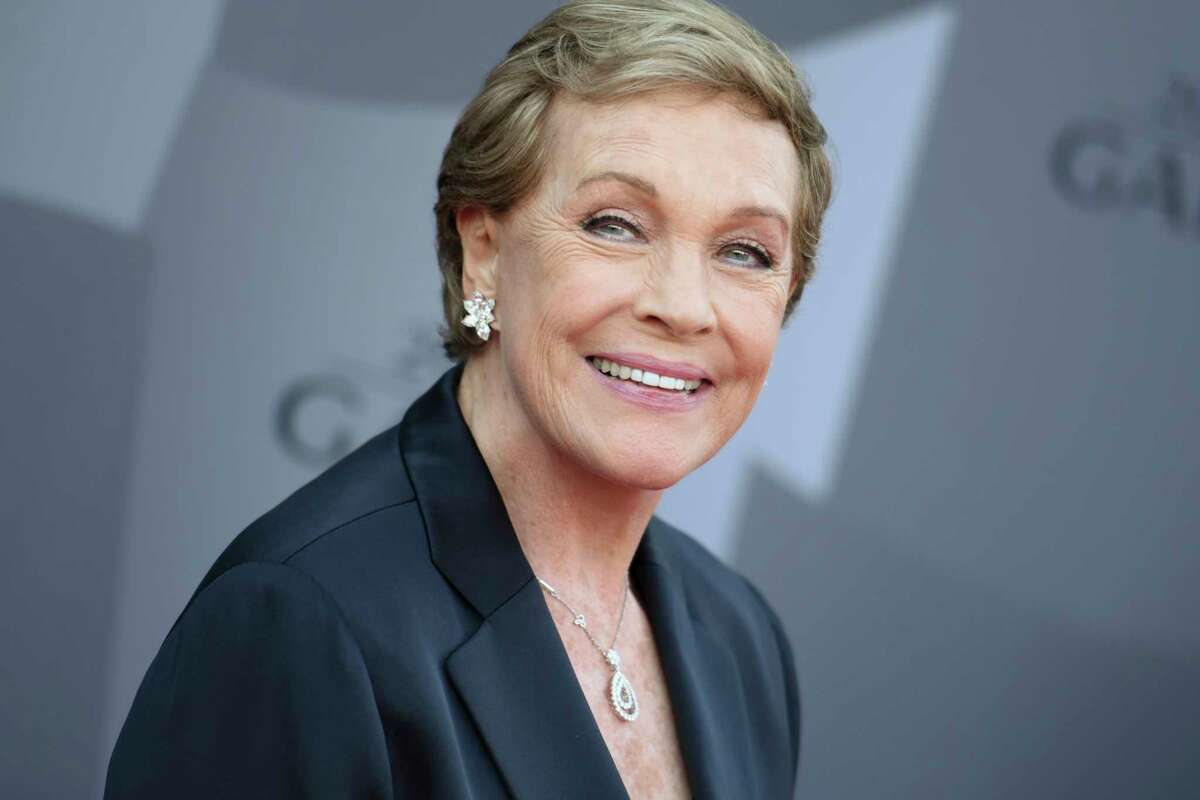 FILE - In this Sept. 29, 2015 file photo, actress Julie Andrews arrives at the Los Angeles Philharmonic 2015/2016 season opening gala at Walt Disney Concert Hall in Los Angeles. Andrews released a memoir, aHome Work: A Memoir of My Hollywood Years,a which hits shelves on Oct. 15, 2019. (Photo by Richard Shotwell/Invision/AP, File)
