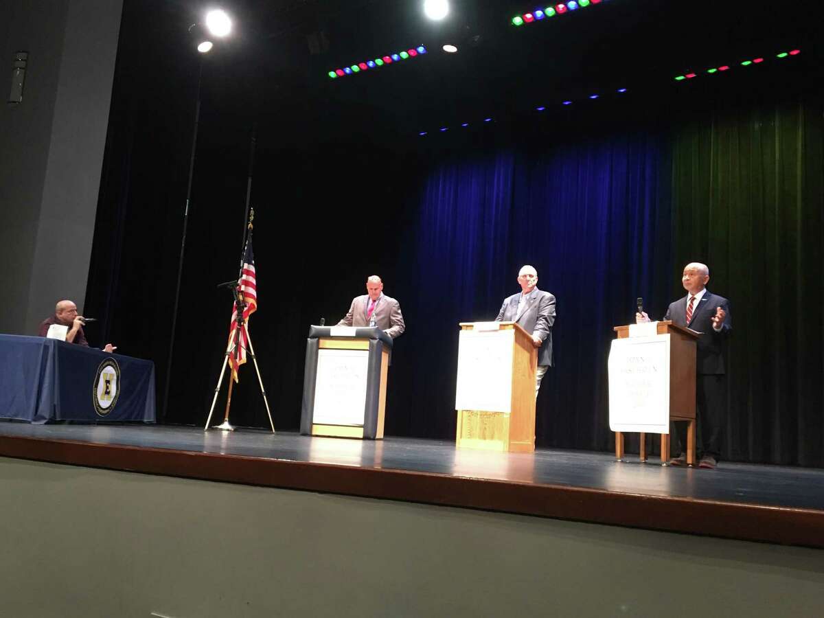 The lighting in the East Haven High School auditorium was on display when East Haven mayoral candidates Democrat Joe Carfora, Republican "Big Steve" Tracey and independent Oni Sioson met on Oct. 15, 2019 in their only debate of the 2019 election season.