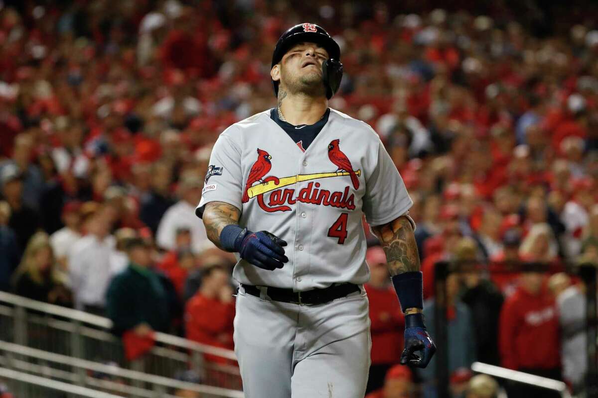 St. Louis Cardinals' Yadier Molina reacts after being hit by a pitch during the eighth inning of Game 4 of the baseball National League Championship Series against the Washington Nationals Tuesday, Oct. 15, 2019, in Washington. (AP Photo/Jeff Roberson)