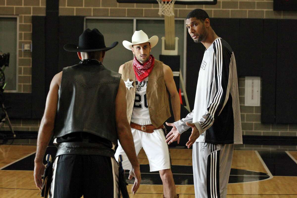 Spurs' Tony Parker (with back to camera), Manu Ginobili and Tim Duncan film a commerical for HEB Monday Oct. 4, 2010 at the Spurs practice facility. (PHOTO BY EDWARD A. ORNELAS/eaornelas@express-news.net)