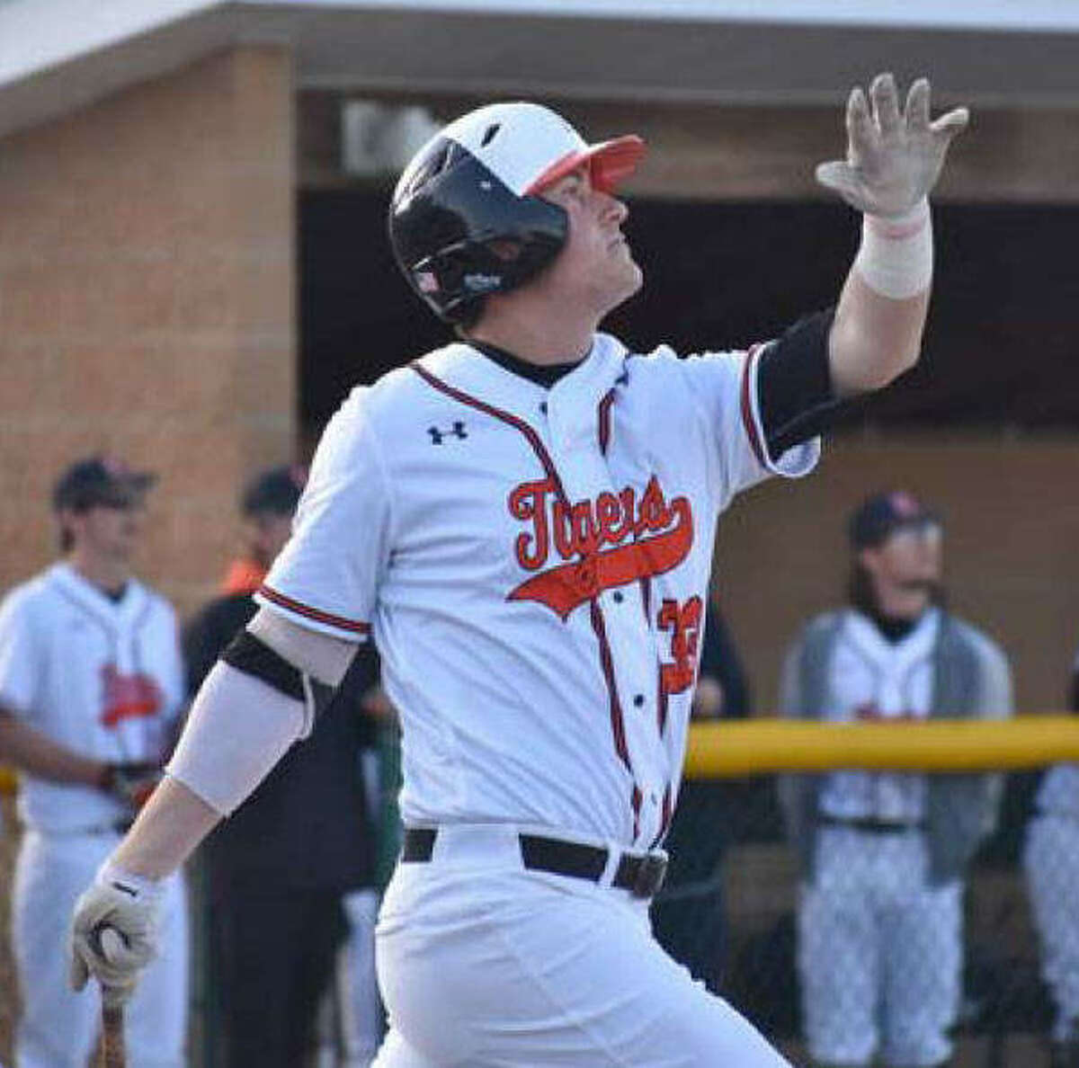 Drake Westcott watches his third home run leave the park against Granite City in a game last year.