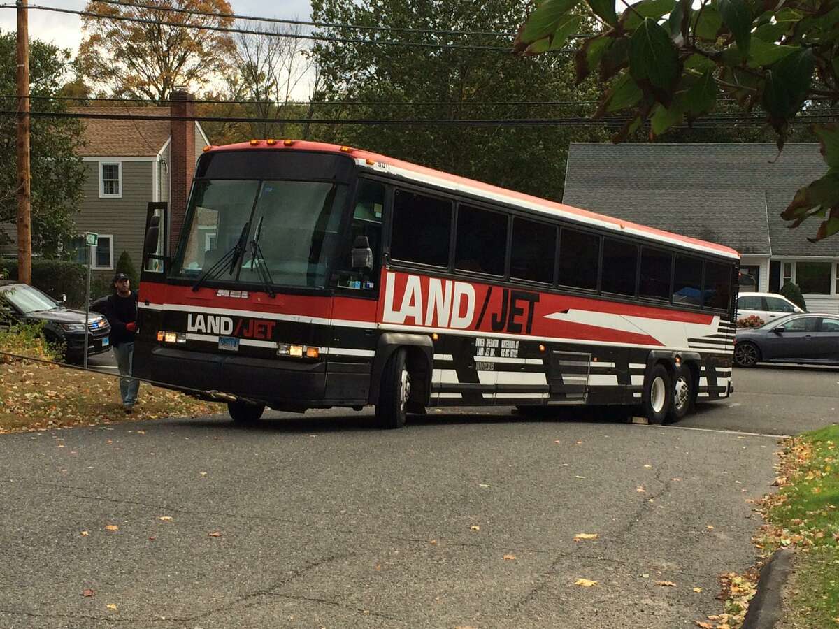 A coach bus on its way to pick up students at St. Theresa School for a field trip got stuck Thursday morning when it could not make the turn onto Rosemond Terrace. The trip had already been canceled due to the delayed opening, but the driver said he had left Waterbury at 7 a.m. and had not been informed the trip was off.