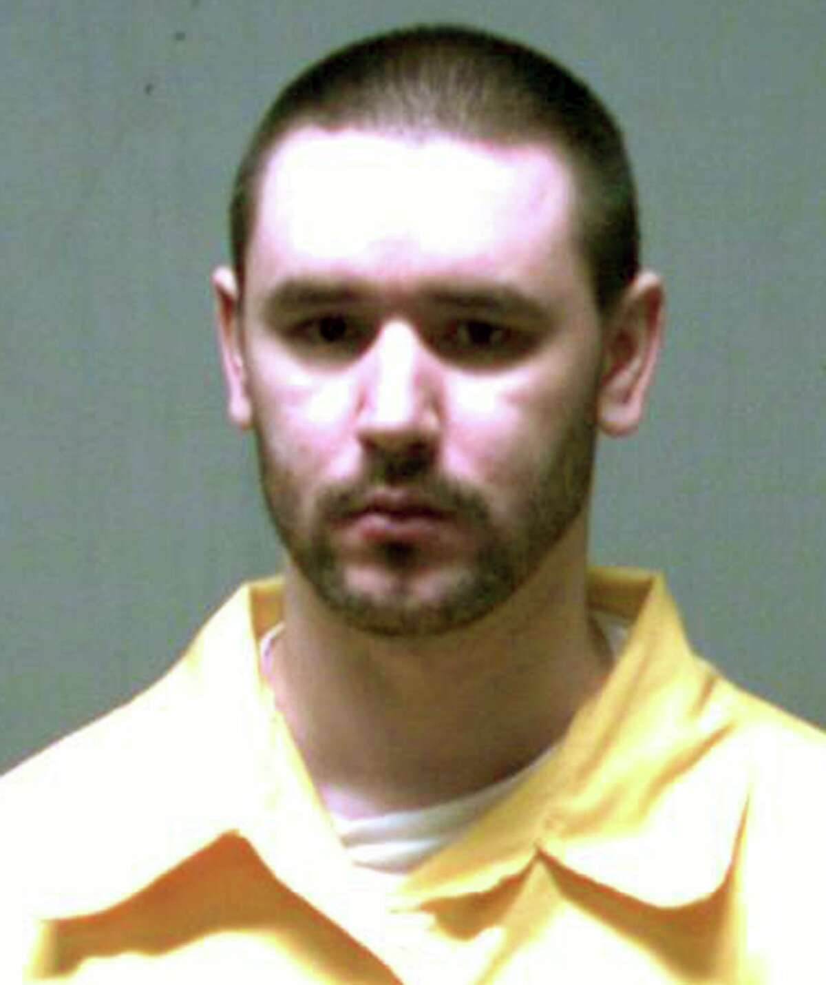 This undated inmate identification photo released Monday, Feb. 22, 2016, by the Connecticut Department of Correction shows Joshua Komisarjevsky, convicted of murder and other crimes during a 2007 home invasion in Cheshire, Conn. Killed were Jennifer Hawke-Petit and her two daughters, ages 11 and 17. Her husband William Petit was severely beaten but survived. Appellate lawyers for Komisarjevsky are expected to argue Tuesday, Feb. 23, 2016 in New Haven Superior Court that his trial lawyers weren’t provided with police phone call recordings crucial to the defense. (Connecticut Department of Correction via AP)