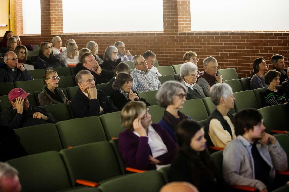 Guests listen as Michigan Attorney General Dana Nessel speaks about the Freedom of Information and Open Meetings acts during a public forum hosted by the Michigan Press Association and the Midland Daily News Thursday, Oct. 17, 2019 at Grace A. Dow Memorial Library. (Katy Kildee/kkildee@mdn.net)