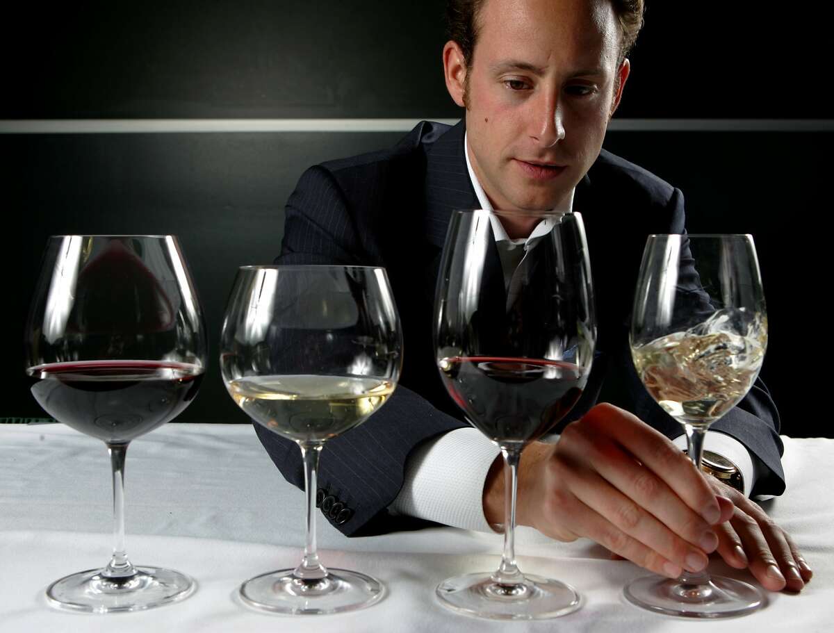 Wine Glass Designer Maximilian Riedel with some of his wine glasses at Taste Washington (wine) Education Day at the Bell Harbor International Conference Center in Seattle, WA on Saturday April 9, 2005. (Photo by Kevin P. Casey)