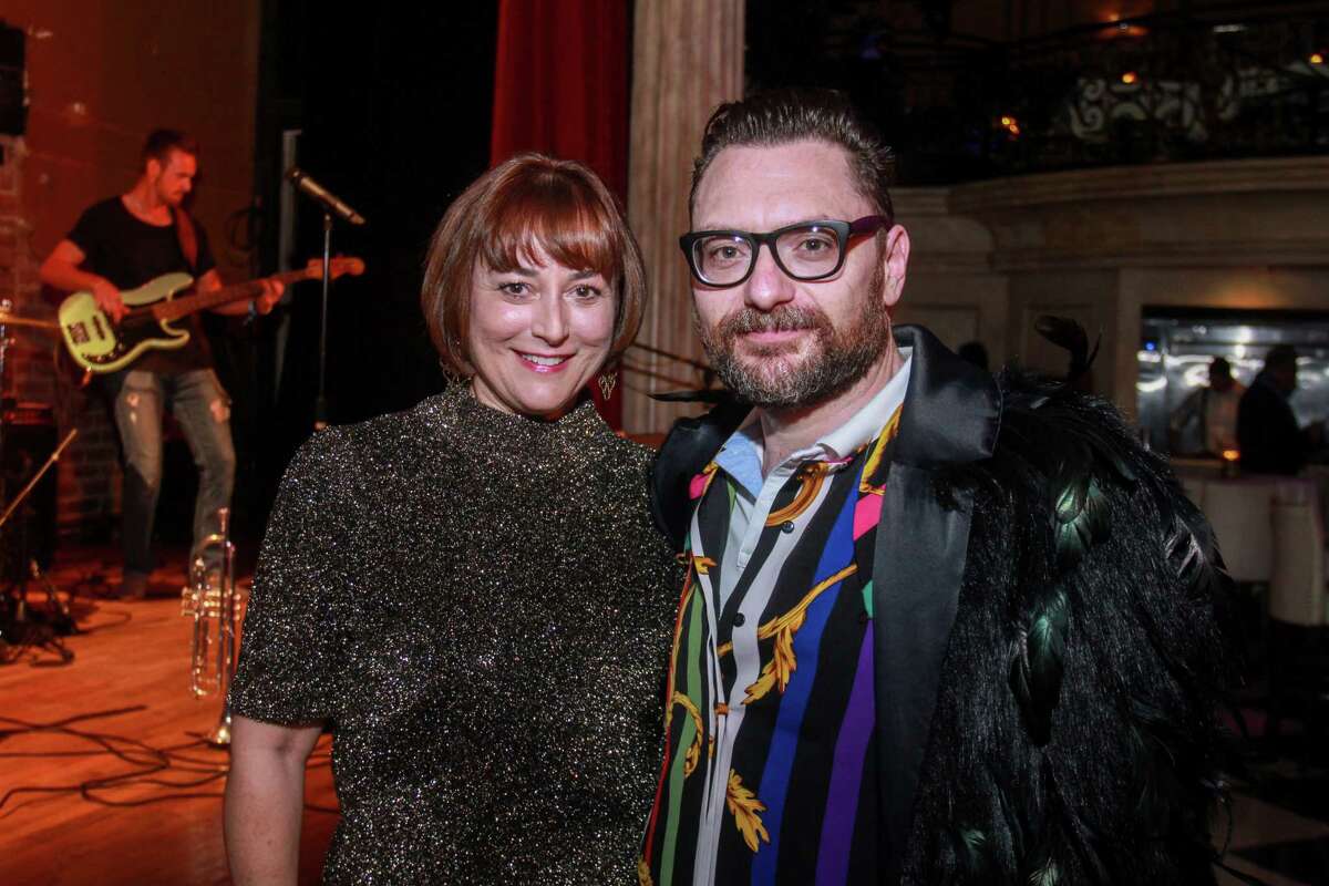 Board chair Leigh Smith, and John Abodeely at the Houston Arts Alliance's Immerse cocktail reception showcasing a number of local performers and artists at the Prohibition Theatre on October 16, 2019.
