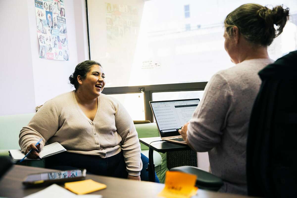 Sondra Santana, agreement monitor and case manager at the Huckleberry Community Assessment Resource Center (CARC), left, speaks during a meeting with Program Director Stacy Sciortino who leads the organization’s “Make It Right” restorative justice program where it facilitates community-based dialogue between juvenile offenders and victims to develop an agreement to make amends on October 17, 2019 in San Francisco, California.