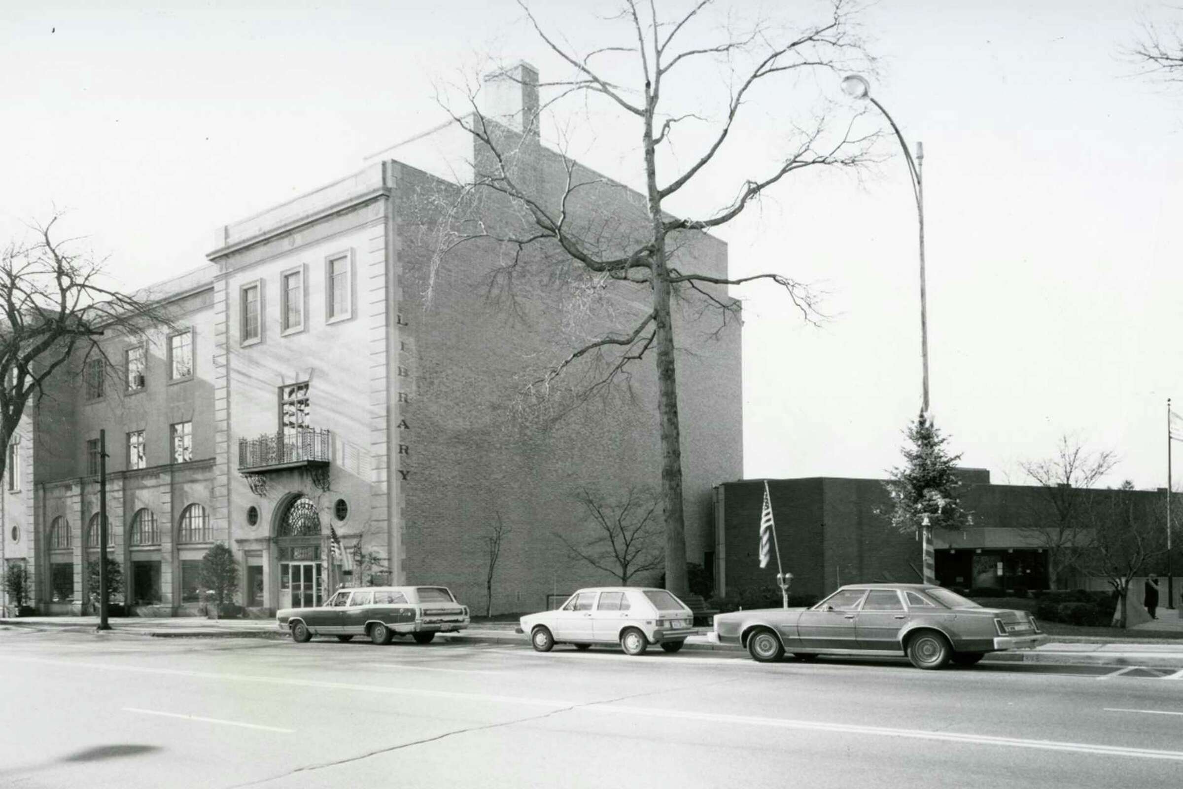 A historic image of Greenwich Library on West Putnam Avenue featuring the pin oak tree with no leaves.
