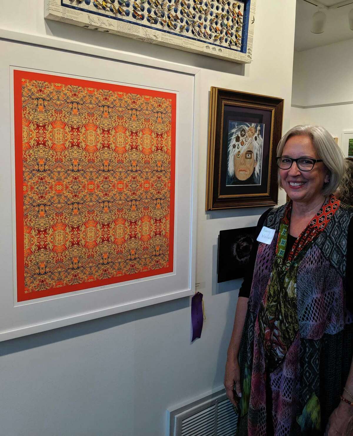 Nancy Woodward won best in show with her digital photograph Wishes at the Rowayton Arts Center on Oct. 13.