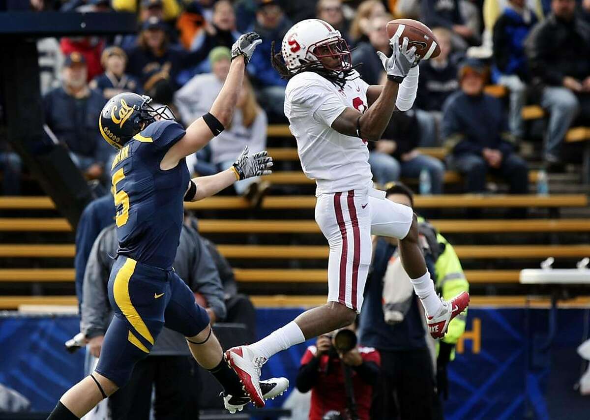 Stanford's Richard Sherman steps in front of Cal's Alex Lagemann for an interception in the first quarter of the Big Game at Memorial Stadium in Berkeley on Saturday.