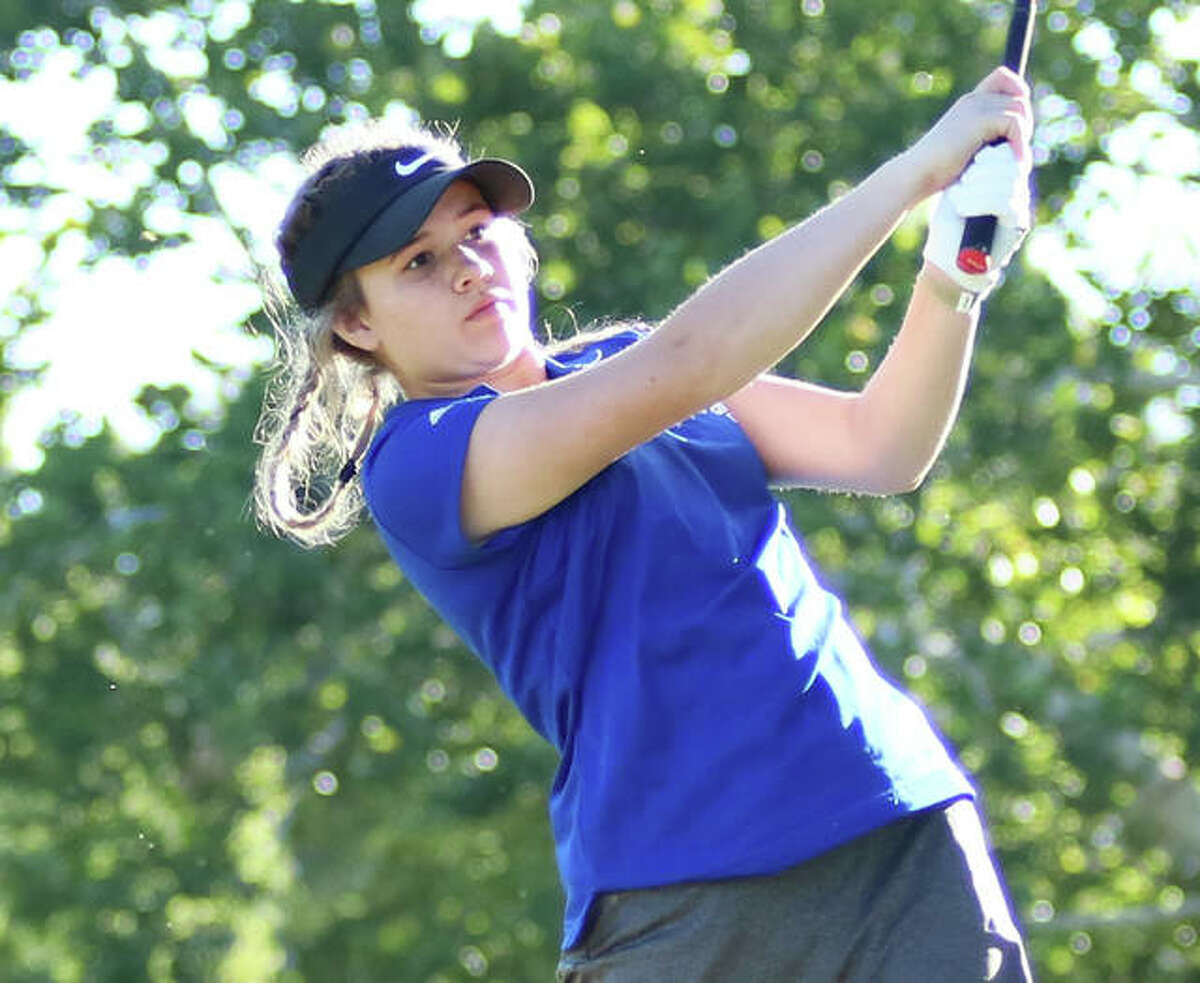 Marquette Catholic’s Clancy Maag watches her shot during the Class 1A sectional on Monday in Mount Carmel.