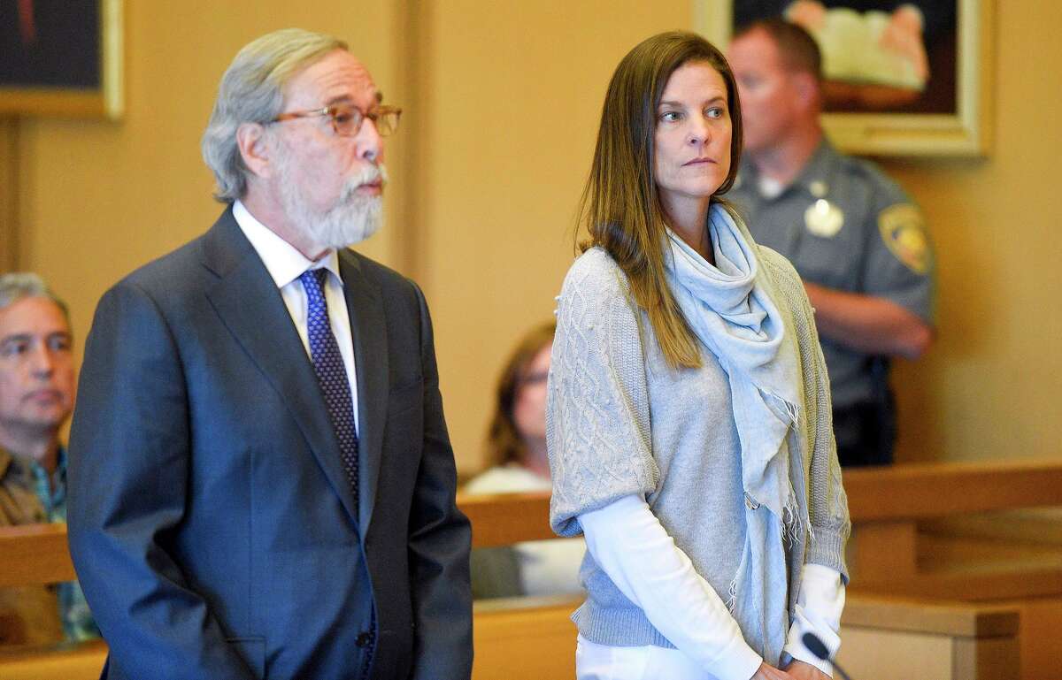 Michelle Troconis, with her attorney Andrew Bowman, appears for a hearing at Stamford Superior Court, Friday, Oct. 4, 2019 in Stamford, Conn.