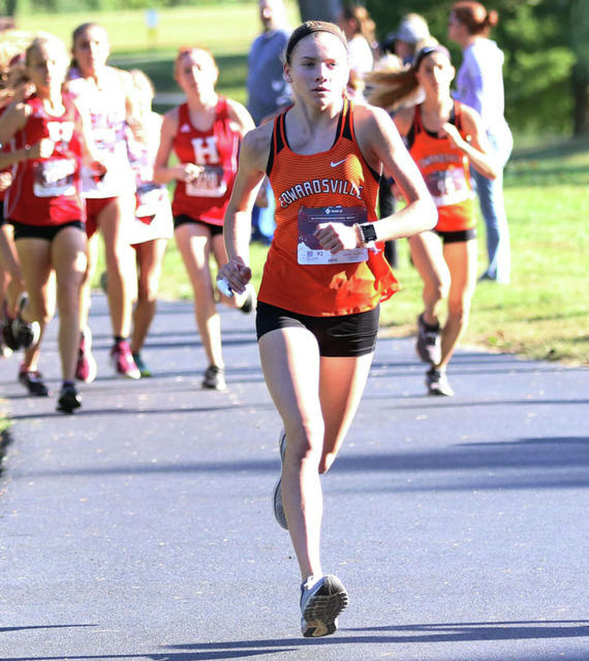 Edwardsville freshman Riley Knoyle, shown on her way to victory at the Madison County Meet on Oct. 8 at Belk Park in Wood River, added another win Thursday at the Southwestern Conference Meet at Moore Park in Alton.