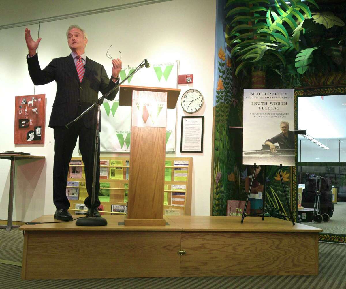 60-Minutes correspondent Scott Pelley talks to a sold-out crowd at the Wilton Library about his new book "Truth Worth Telling," Thursday night, October 17.