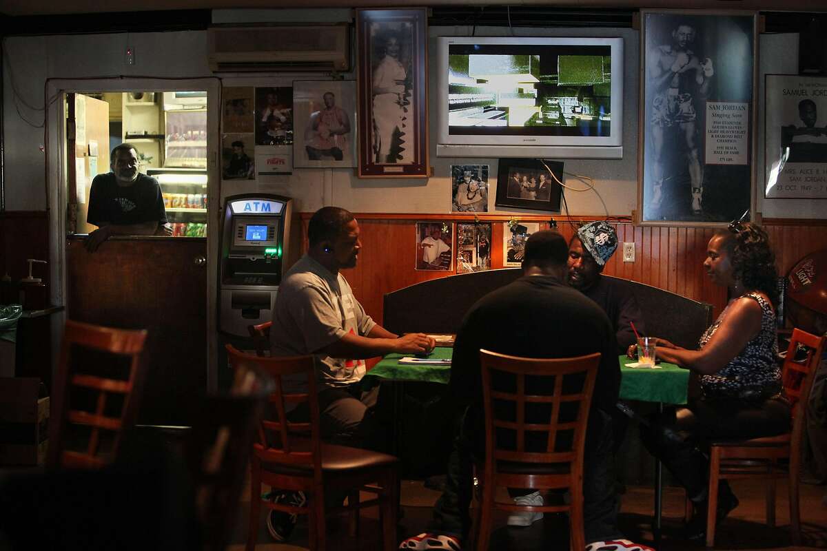 Domino is a favorite table game at Sam Jordan's House of Ribs, 4004 3rd St., in San Francisco, California, on Tuesday,