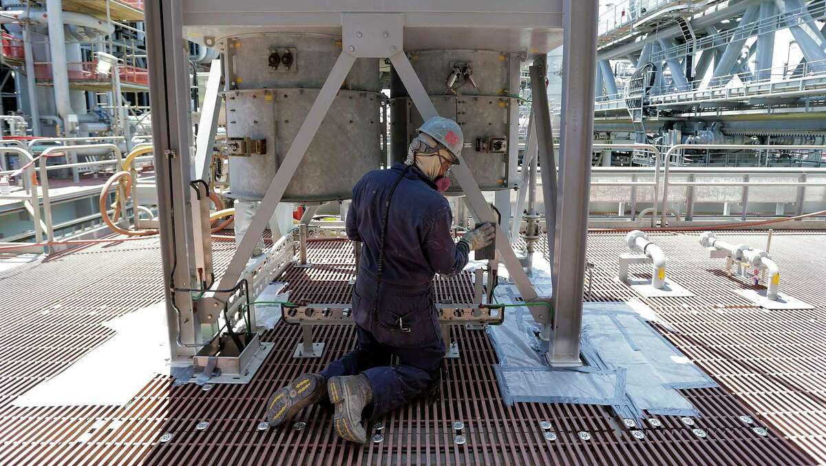 An employee working on a deepwater platform. The oil and gas industry is cutting jobs in Texas.