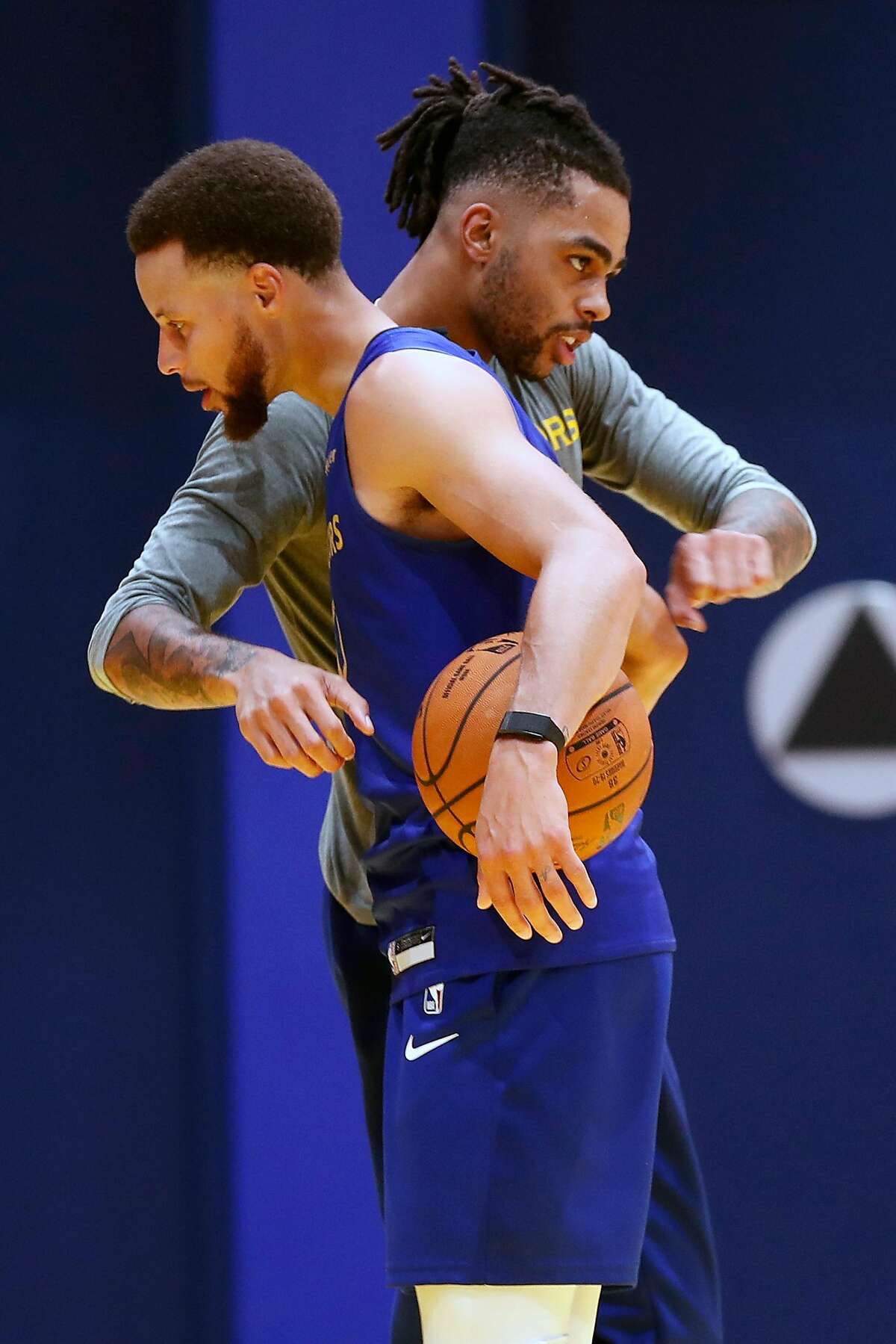 Golden State Warriors' Stephen Curry and D'Angelo Russell during training camp at Chase Center in San Francisco, Calif., on Tuesday, October 1, 2019.