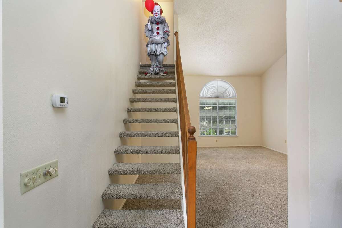 Realtor Kristy Dakin told mySA.com she tapped into her spooky side to create the listing for the 9338 Chattanooga Drive home and dressed up as Pennywise from the horror movie "It" for the staging pictures. She said the four-bedroom, two-story home hit the market Thursday night with photos featuring her as the clown.
