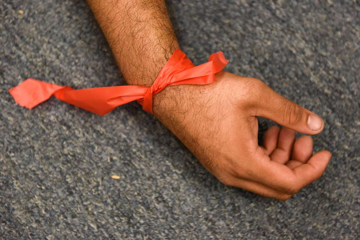 Triage tape used in a drill during a San Francisco Fire Department's NERT (Neighborhood Emergency Response Team) training class on September 26, 2019 in San Francisco, Calif.