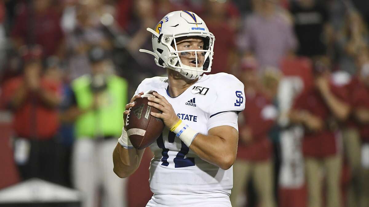 San Jose State quarterback Josh Love drops back to pass against Arkansas during an NCAA college football game, Saturday, Sept. 21, 2019 in Fayetteville, Ark. (AP Photo/Michael Woods)