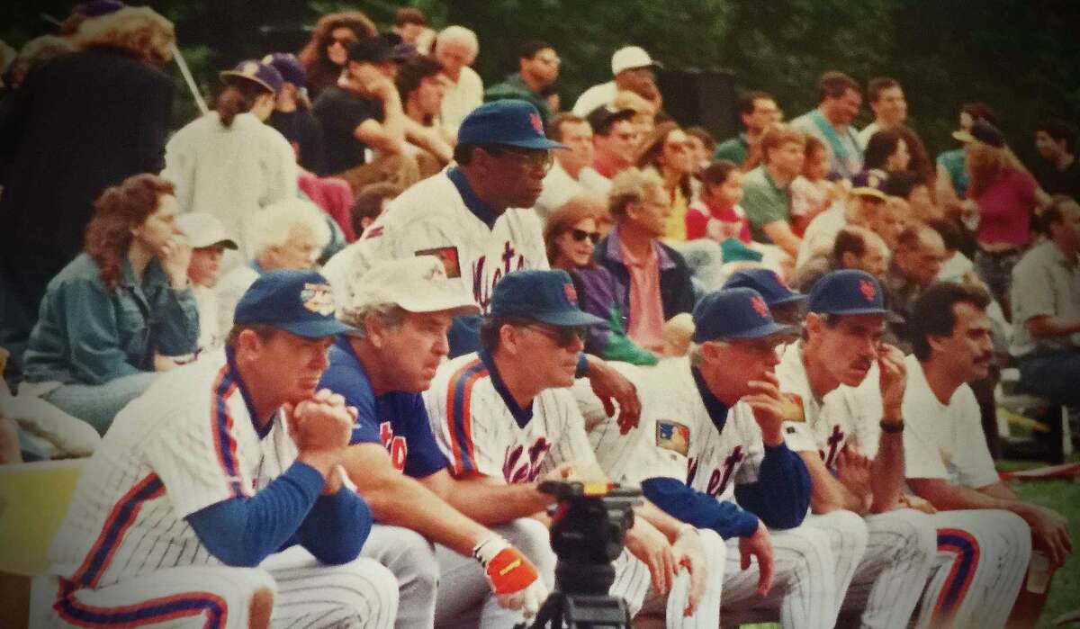 Members of the 1969 New York Mets watch a charity softball game on Sept. 24, 1994 at Havemeyer Field in Greenwich, Conn. The lineup included, from left, Jerry Grote, Ed Kranepool, Ron Swoboda, Donn Clendendon (standing), Bud Harrelson and Art Shamsky.