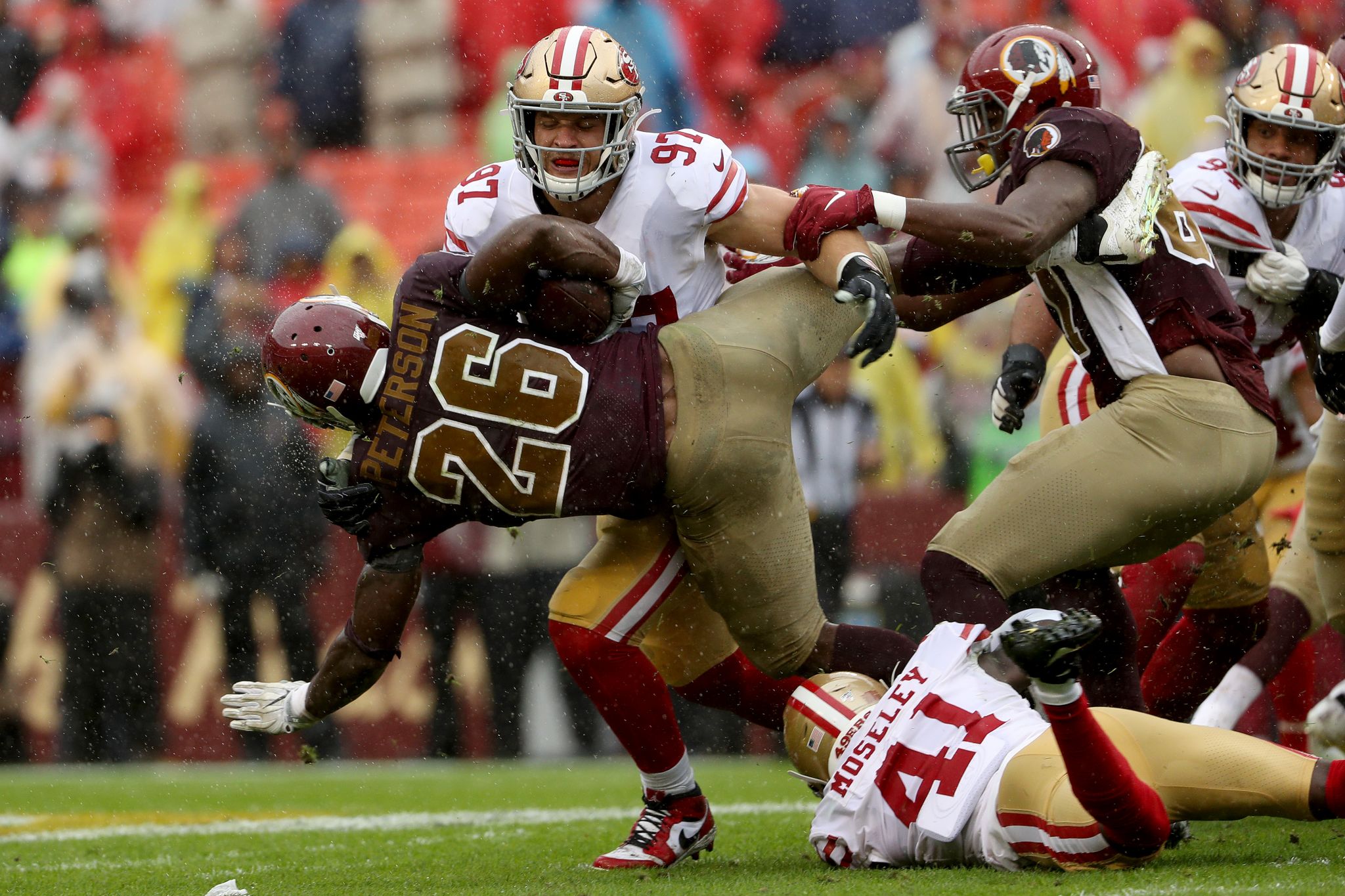 Drenching rain turns 49ers game into giant slip-n-slide