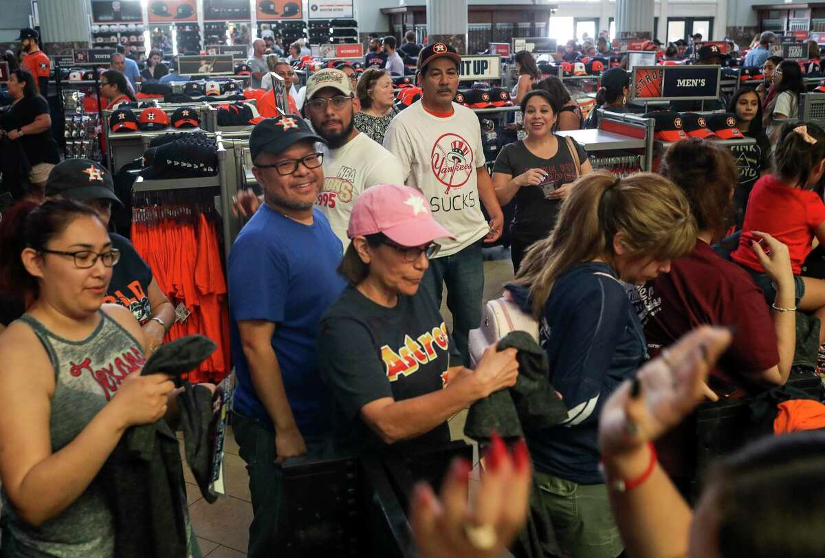 Houston Astros players shop with kids at Academy during Astros-Caravan stop