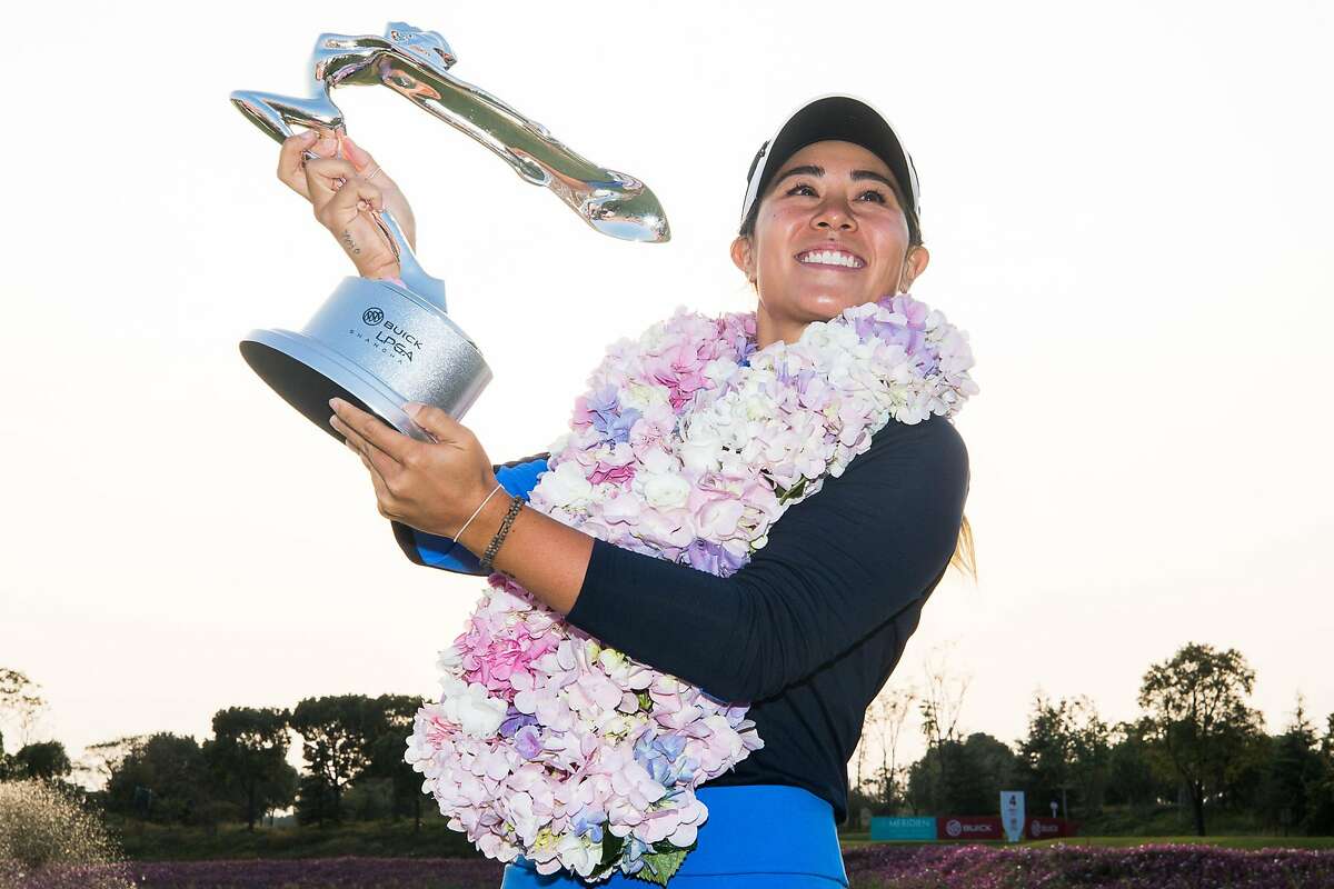 SHANGHAI, CHINA - OCTOBER 20: Danielle Kang of USA poses for photoshot with the trophy after winning 2019 Buick LPGA Shanghai at Shanghai Qizhong Garden Golf Club on October 20, 2019 in Shanghai, China. (Photo by Yifan Ding/Getty Images)