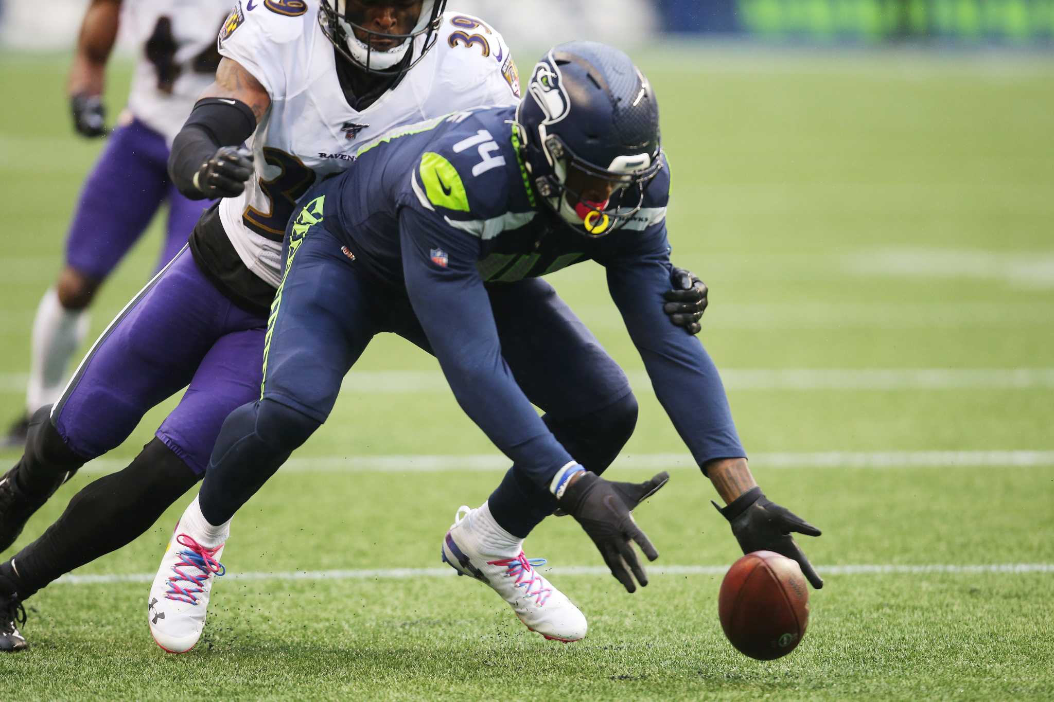 Seattle Seahawks' D.K. Metcalf catches a touchdown pass during the second  half of an NFL wild-card playoff football game against the Philadelphia  Eagles, Sunday, Jan. 5, 2020, in Philadelphia. (AP Photo/Julio Cortez