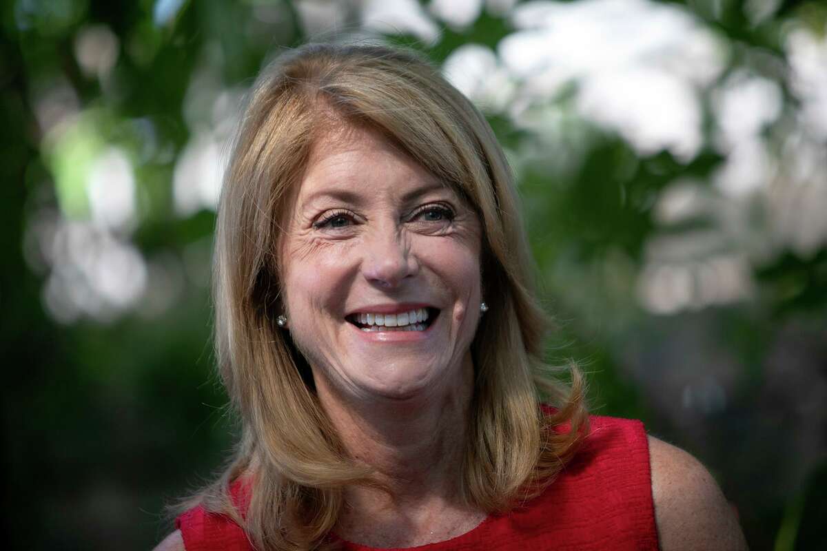Wendy Davis visits with a group of community members, mainly educators, moms and community activists, during her “Listening From the Heart of Texas” tour at CommonWealth Coffeehouse & Bakery in San Antonio on Friday, July 26, 2019. Davis married private investor and attorney Alan Schoenbaum on Sunday.