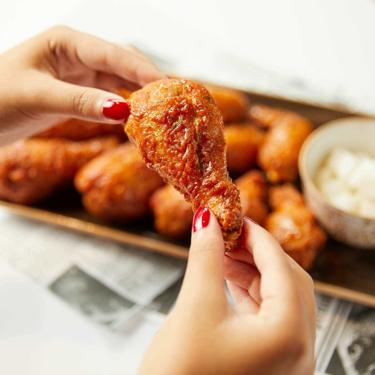 Korean fried chicken brand Bonchon has announced it will open in Midtown at 2100 Travel in 2020.