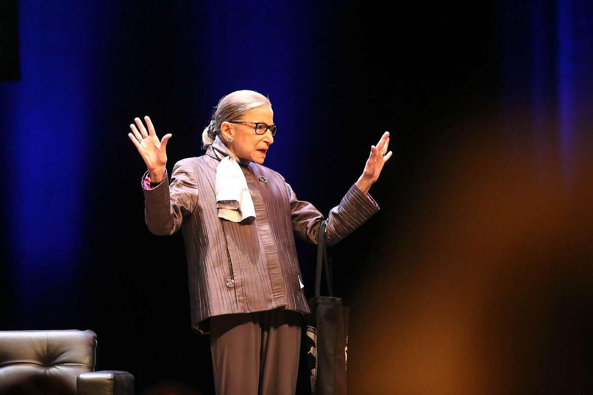Associate Justice of the Supreme Court of the United States Ruth Bader Ginsburg waves from the stage before speaking at the inaugural Herma Hill Kay Memorial Lecture at UC Berkeley’s Zellerbach Hall on Monday, October 21, 2019 in Berkeley, Calif.