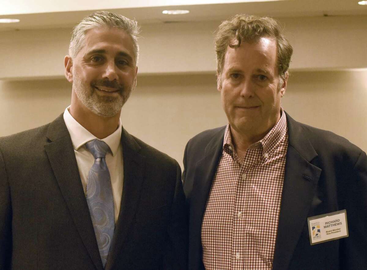 Norwalk’s Peter Tucci, Jr., left, with Fairfield County Sports Commission board member Richard Matthews during the commission’s annual Sports Night awards dinner at the Stamford Marriott on Monday. Tucci was inducted into the FCSC Hall of Fame in the James O’Rourke Amateur Wing.